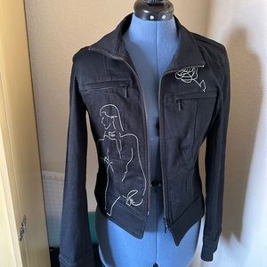 NWOT black jacket with woman’s face embroidered Size 6!
